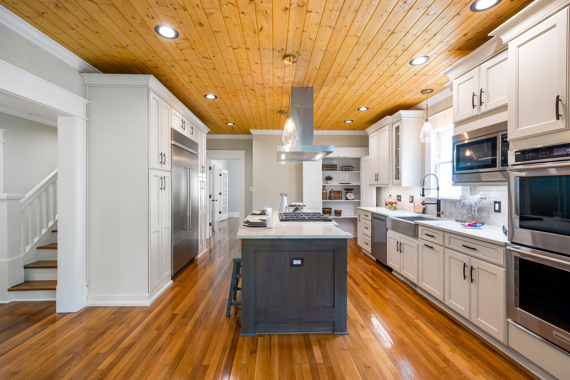 Renovated investment property kitchen with a large island
